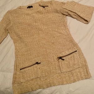 Sweater cream colored with adorable zipper detailing & pockets